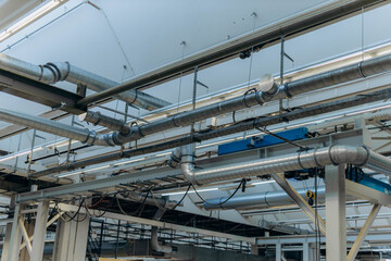 Overhead crane or bridge crane consists of parallel runways with a bridge between column also include hoist lifting and rope. Machinery for manufacturing or transportation in factory or warehouse.