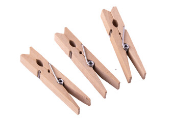wooden clothes pegs on white background