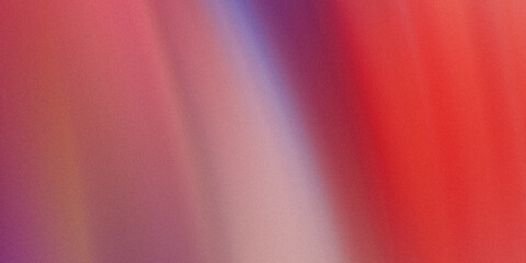 Abstract background featuring shades of red purple and pink creating a soft and blurred effect