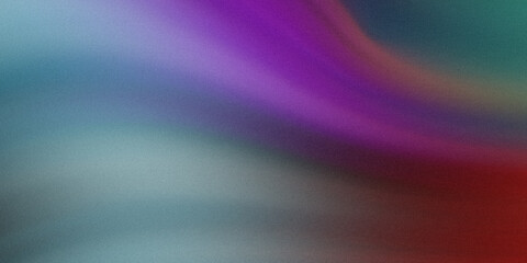 A blurred abstract background featuring shades of purple, blue, green, and a touch of red color gradient