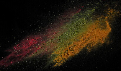 Seasoning explosion, colorful powder scattered, acai, matcha and turmeric isolated on black, top view, clipping path