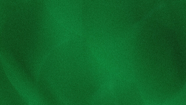A blurry green background with varying shades of color creating a soft and abstract visual effect seen here