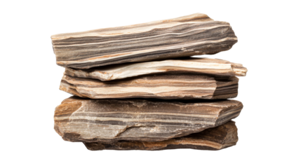Stacked striped stones against black background, cut out transparent