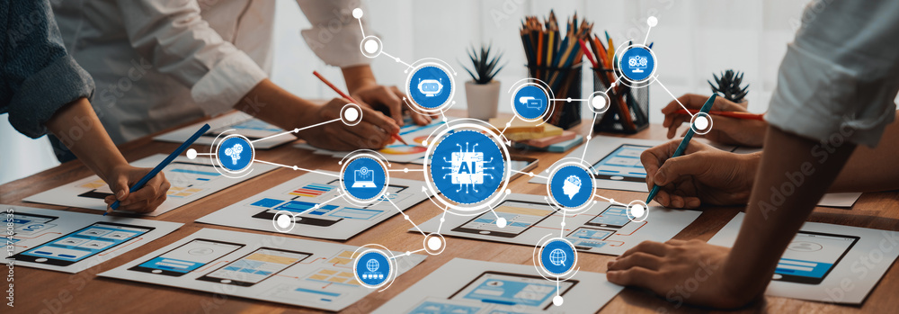 Poster A dynamic workspace scene featuring a collaboration on AI concepts, with hands actively engaged in sketching mobile app designs and brainstorming innovative ideas. Amity
