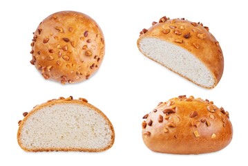 Rye bun with peanuts on a white isolated background