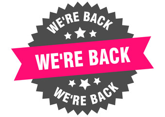 we're back. we're back round pink label isolated on transparent background