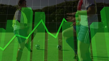 Green financial graph animation over soccer players practicing on field - Powered by Adobe