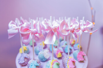 Elegant Pastel Cake Pops with Pink Bows, Perfect for Celebration or Treat