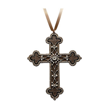 A decorative ornate cross with a ribbon on a black background with floral and vine embellishments