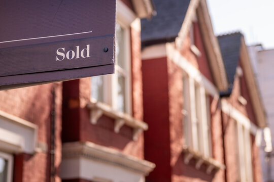 UK- London houses SOLD advertised by estate agent sign