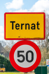 Traffic sign of Ternat, an urbanisation with a maximum speed limit of 50, Ternat, Flanders, Belgium