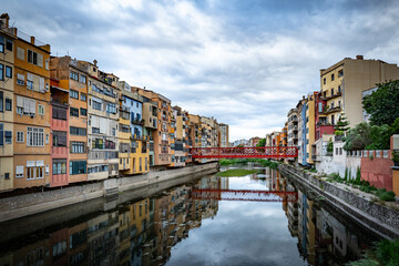 Colorful facades of houses on the river Onyar in Girona, Spain