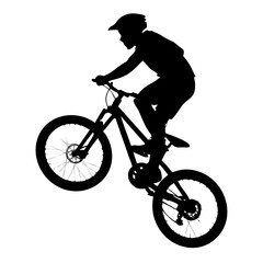 Fototapeta premium Mountain Biking Silhouette: A bold, dynamic silhouette of a mountain biker in mid-air, showcasing the exhilarating rush of speed and daring maneuvers.