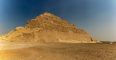 Explore Zoser's grand Step Pyramid in Saqqara, Egypt, a key feature of the ancient Memphis...