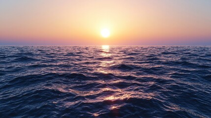 Fototapeta premium A stunning sunset showcases hues of orange and purple against the tranquil ocean. The gentle waves reflect the vibrant colors as day transitions to night.