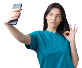 Portrait of a pretty girl taking a selfie isolated over grey background