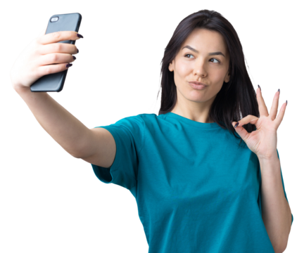 Portrait of a pretty girl taking a selfie isolated over grey background - Powered by Adobe