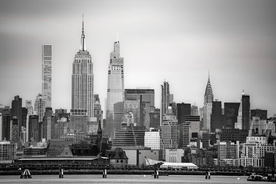 New York City, Manhattan skyline from Liberty Park New Jersey. Empire State Building, Vanderbilt tower, Chrysler building, Hudson River