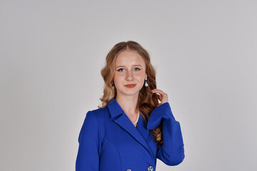Elegant woman in a blue blazer dress