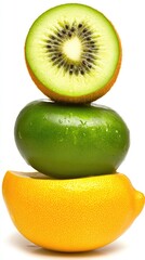 Fototapeta premium A halved kiwi balanced atop a green fruit, which rests on a lemon half