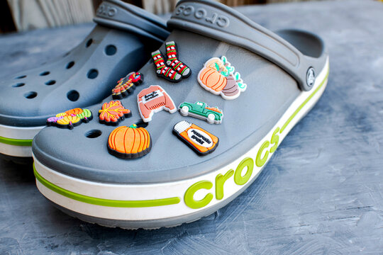 Decorative embellishments for Crocs flip-flops - Jibbitz. Special inserts for shoe openings.