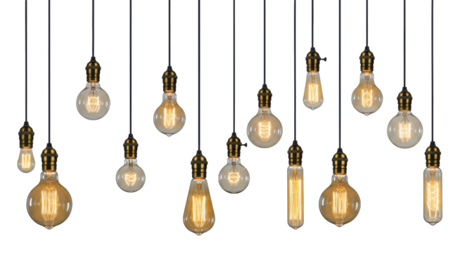 Assortment of vintage style light bulbs hanging against a dark black studio background scene setup shot