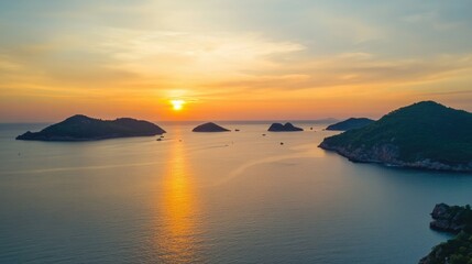 Golden hour over the sea with a few islands