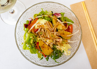 Japanese salad with tomatoes, cucumbers and onions