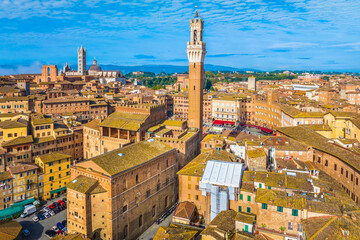 Obraz premium Breathtaking aerial view of the historic city of Siena, Italy, showcasing its medieval architecture, terracotta rooftops, and iconic landmarks in world famous region of Tuscany, Europe