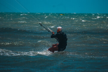 Fototapeta premium Kitesurf Kite Surf Vento Esporte Velejo Praia Preá Ceará Nordeste Brasil Mar Ondas Prancha Atleta Adrenalina Competição Natureza Verão Turismo Verão Ativo Onda Surfar