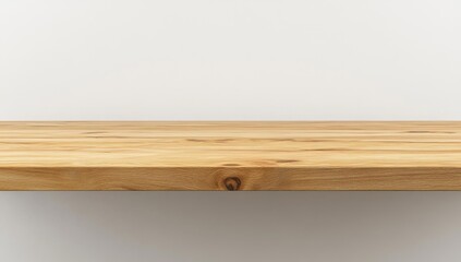 Empty light brown wooden shelf against white wall