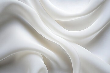 Obraz premium Close up of flowing white fabric with soft shadows and light texture background