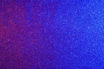 A blue and red background with a lot of small dots