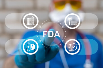 Doctor person using virtual touch screen push acronym: FDA. Food and Drug Administration (FDA) Department Service Medical Concept. FDA Health Care Control System.
