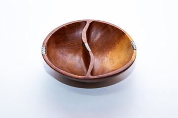 High angle view closeup of empty new wood plate on a white background 