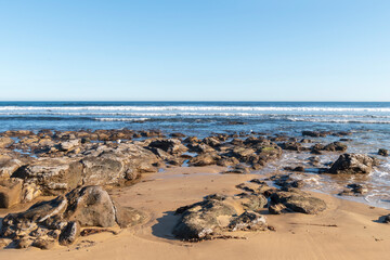 waves breaking over the rocks