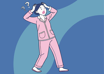 Fototapeta premium Asian woman in pink pajamas looks surprised and confused with mouth open and both hands raised, standing against a solid blue background, expressing shock or uncertainty in casual sleepwear