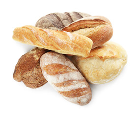 Different loaves of freshly baked bread isolated on white, top view