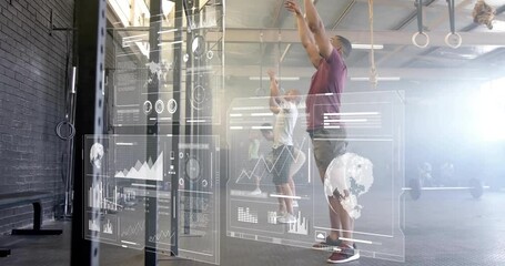 Exercising in gym, two people with digital animation data graphics overlay - Powered by Adobe
