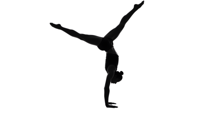 Woman Practicing Handstand Yoga Position with Legs Split Against White