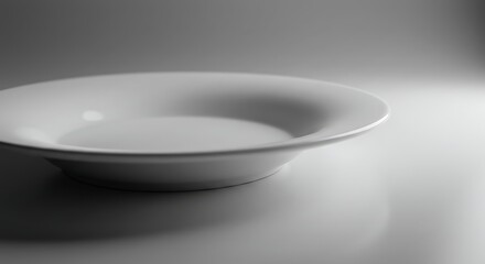 White Soup Plate in Minimalist Setting Offering Culinary Presentation Potential