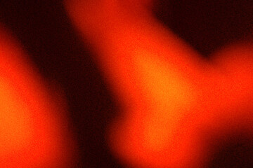 Abstract warm orange and black gradient background with noise grain overlay texture. Suitable for...