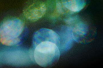 Light leaks on dark background. The colors and shapes create a sense of movement and energy....