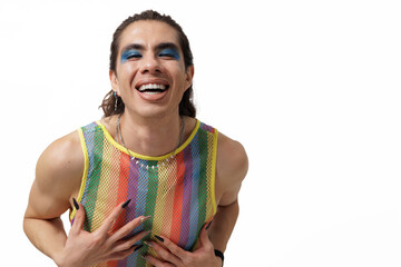 Genderless person wearing pride clothing smiling and posing happily for the camera