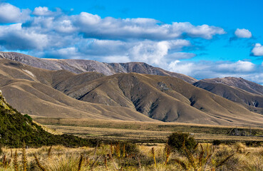 Oteake conservation area otago new zealand hills velvety beautiful landscapes dry yellow brown grass bare land