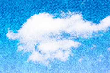 Distressed vintage sky halftone background with wispy white clouds and warm golden hues