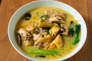 A bowl of delicious Chinese chicken noodle soup
