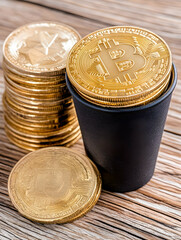 Golden cryptocurrency coins stacked beside a cup on wooden surface . AI generative