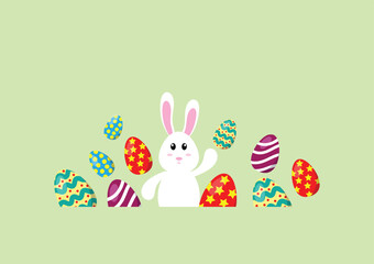 Colorful of easter eggs with a white bunny on a green background.