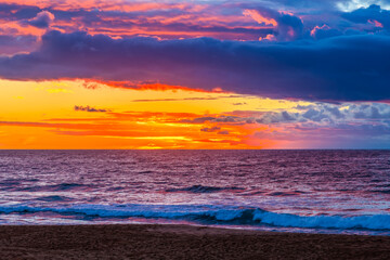 Sunrise at the Seaside with rain clouds
